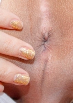 Ladyboy Phatida is wearing a sexy white blouse with panties and stockings. She begins to squeeze her tits together over her blouse and her nipples pop