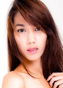 Pim is a true Bangkok beauty, tall, fair skin, beautiful body with long legs, nice cock and a very cute face. Her skin is flawless and she will keep h