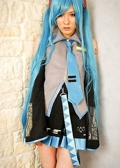 Who is that blue-haired nymph?? Why, it's Lisa, the Tokyo newhalf who can make any man putty in her hands.