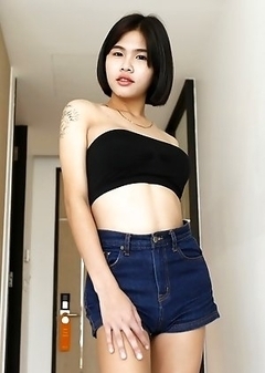 21yo busty Thai shemale Gogo strips for the camera to tease her white cock date