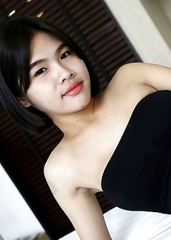21yo busty Thai shemale Gogo strips for the camera to tease her white cock date