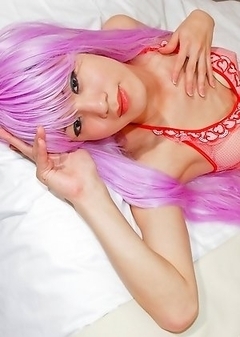 Cute Kanato can fullfill your fantasies in her purple wig, lingerie, and fishnet stockings.